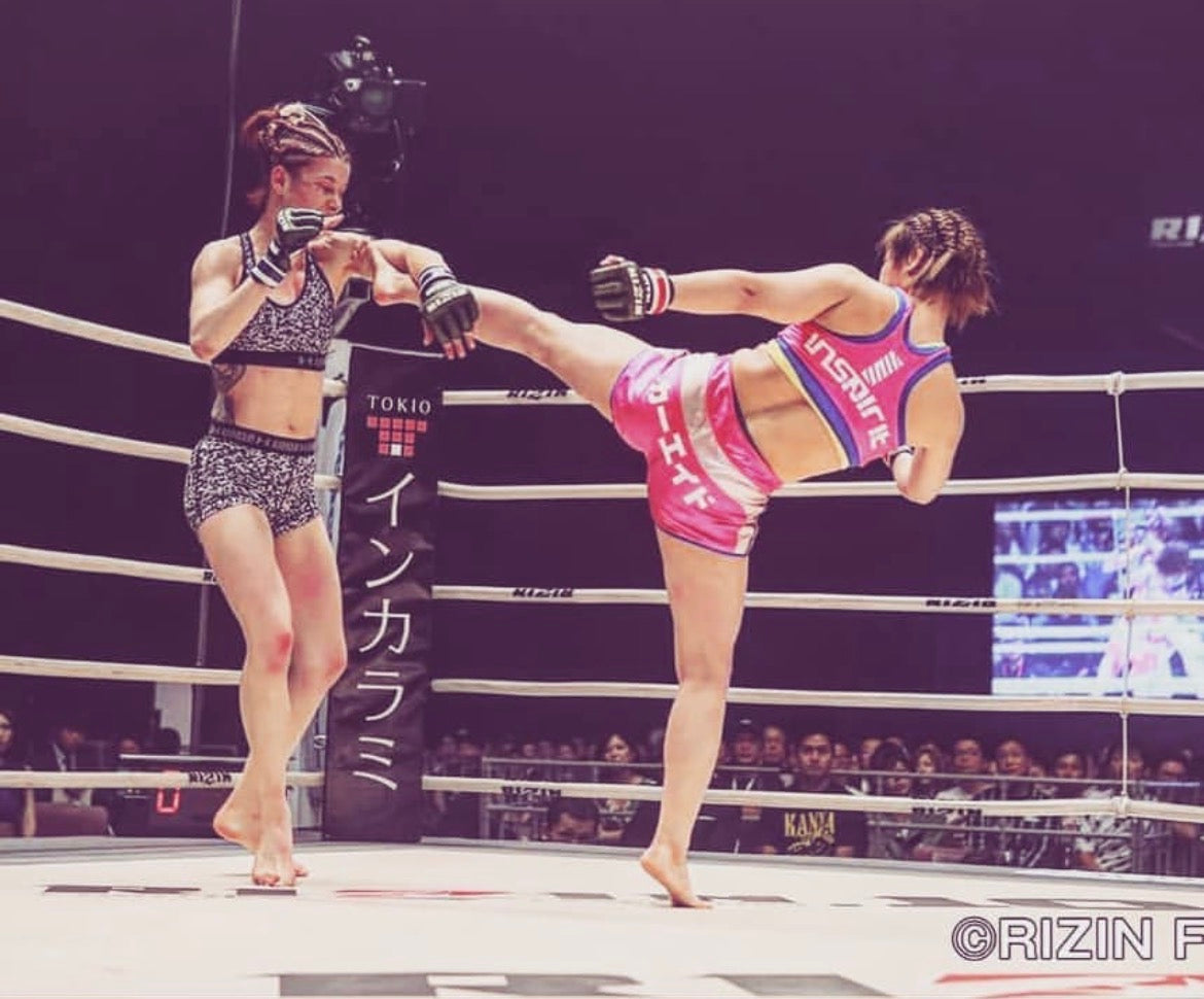 Melissa Karagianis competing as a professional MMA athlete at RIZIN in Japan, highlighting elite performance and body mechanics.